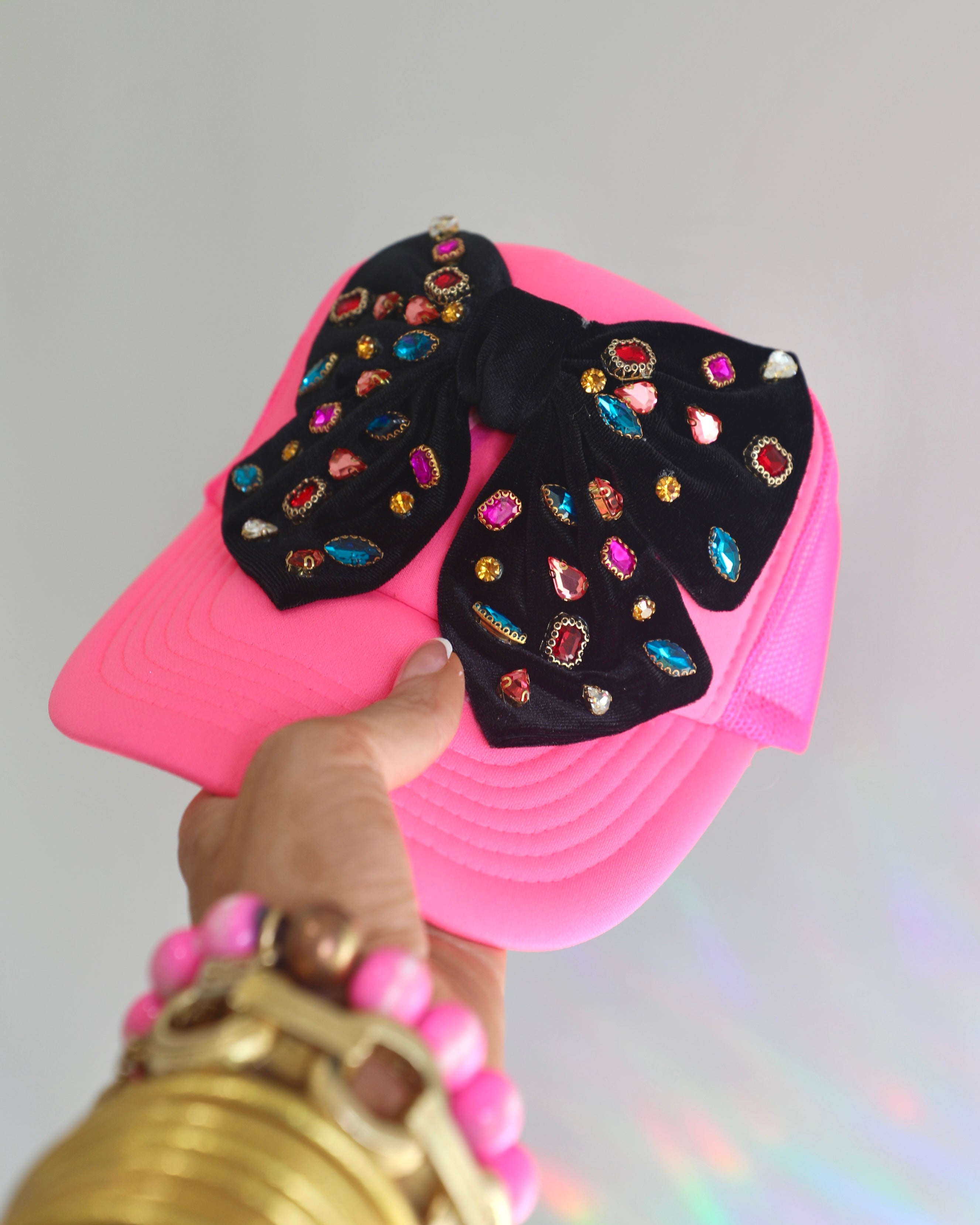 QUEEN BEE PINK GEM BOW TRUCKER HAT