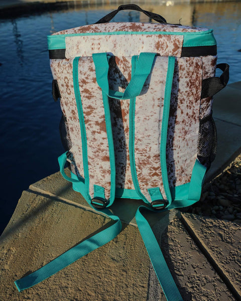 #27 Turquoise + Brown Cow Backpack Cooler Bag - The Lace Cactus